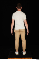  Trent brown trousers casual dressed standing white sneakers white t shirt whole body 0013.jpg
